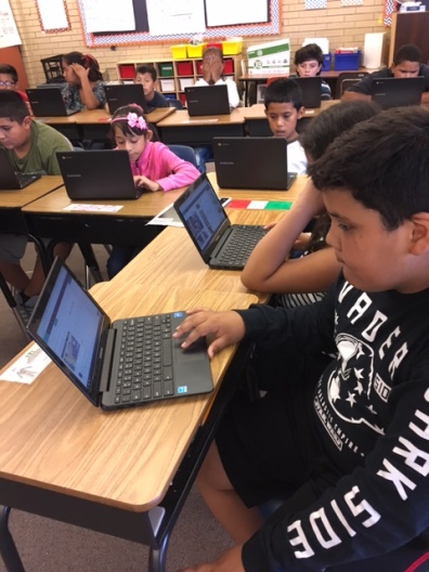 Using Chrome books to complete their PBL project